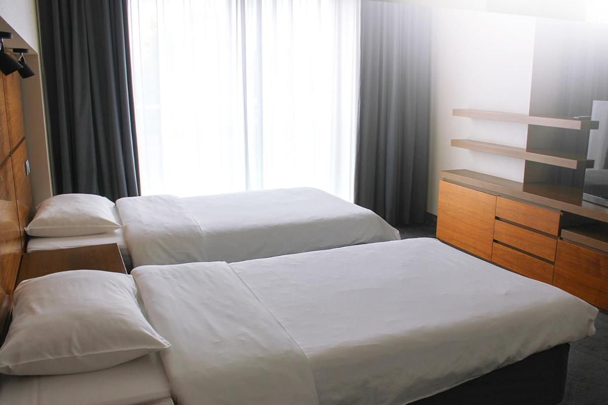 奥斯特罗达 威拉港艺术与商业酒店 外观 照片 A bedroom at the hotel